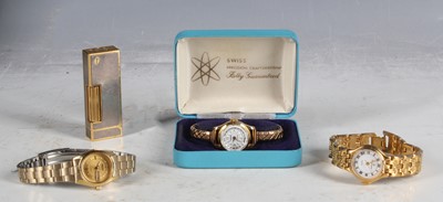 Lot 123 - A ladies' gold-plated Seiko day and date watch...