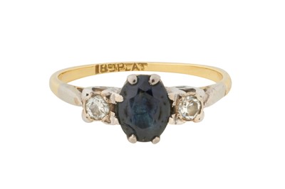 Lot 122 - A SAPPHIRE AND DIAMOND THREE-STONE RING