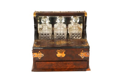 Lot 305 - A VICTORIAN FIGURED WALNUT AND GILT BRASS BOUND TANTALUS