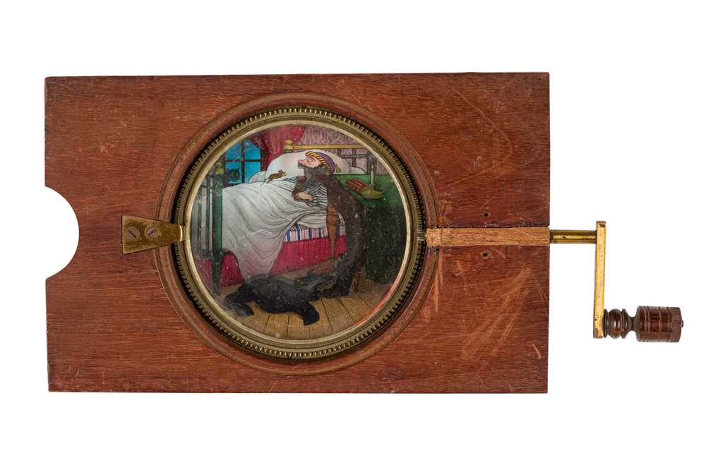 Lot 40 - A Mechanical Rackwork Magic Lantern Slide of a 'Man Swallowing Rats