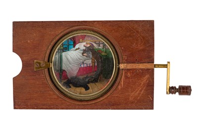Lot 40 - A Mechanical Rackwork Magic Lantern Slide of a 'Man Swallowing Rats