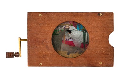 Lot 40 - A Mechanical Rackwork Magic Lantern Slide of a 'Man Swallowing Rats