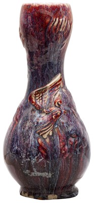 Lot 436 - A CHINESE FLAMBÉ-GLAZED MOULDED 'PHOENIX' VASE