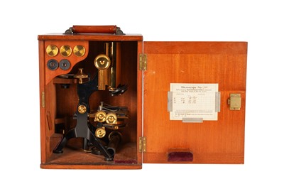 Lot 331 - A W. WATSON & SONS LTD OF 318 HIGH HOLBORN, LONDON BRASS AND EBONISED MICROSCOPE IN TEAK CASE, 1913