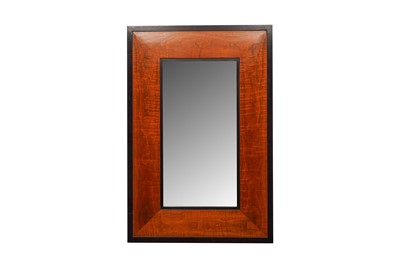 Lot 88 - A CONTEMPORARY WOODEN-FRAMED MIRROR