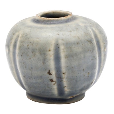 Lot 665 - A small Chinese blue glazed foliate jar, Yuan - Ming dynasty