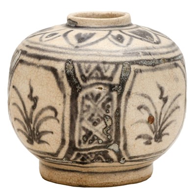 Lot 682 - A Chinese blue and white faceted 'floral' jar, Ming dynasty