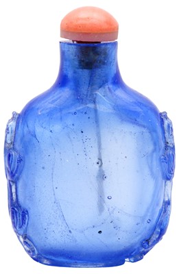 Lot 266 - A CHINESE BLUE GLASS 'CHILONG' SNUFF BOTTLE