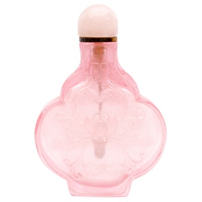Lot 736 - A Chinese pink glass 'lotus' snuff bottle, 18th - 19th century
