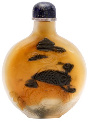 Lot 298 - A CHINESE CARVED GLASS ‘AGATE' SNUFF BOTTLE