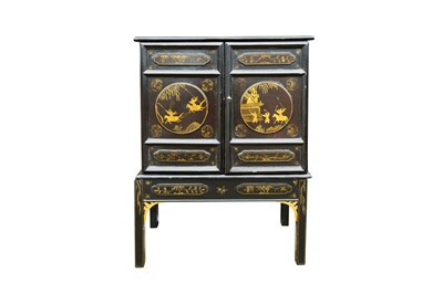 Lot 188 - A BLACK LACQUERED LATE QING DYNASTY CHINESE CABINET ON STAND