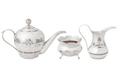 Lot 243 - An early 20th century Iraqi silver and niello three-piece tea service, Omara circa 1930, signed Sa’ad