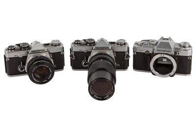 Lot 451 - A Selection of Chrome Olympus OM SLR Cameras