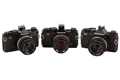 Lot 211 - A Selection of Black OIympus OM2 SLR Cameras