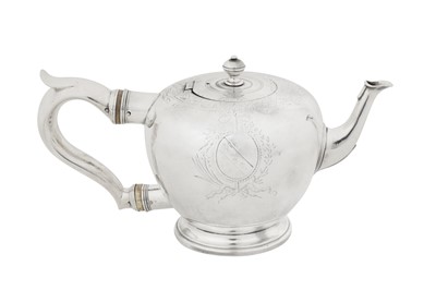 Lot 497 - A George II provincial sterling silver teapot, Newcastle 1732 by Thomas Makepeace I (free. 1727, d. 1739)