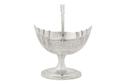 Lot 461 - A George III Irish sterling silver sugar basket, Dublin 1805 by Richard Sawyer