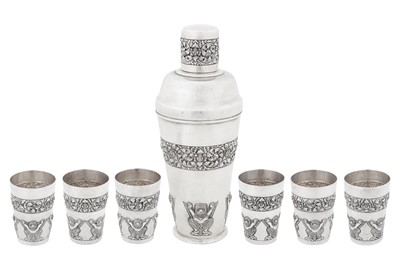 Lot 168 - A mid-20th century Cambodian silver cocktail shaker and cups set, circa 1960