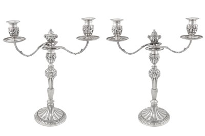 Lot 445 - A pair of George III sterling silver twin branch candelabra, London 1776 by Henry Hallsworth