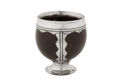 Lot A George II silver mounted coconut cup, London circa 1750 by Thomas Hodges (active from 1748)