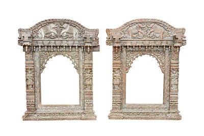 Lot 190 - A PAIR OF CARVED INDIAN JHAROKHA FRAMES