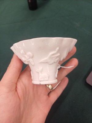 Lot 440 - A Chinese Dehua libation cup and a blanc-de-chine bowl, Kangxi period and later