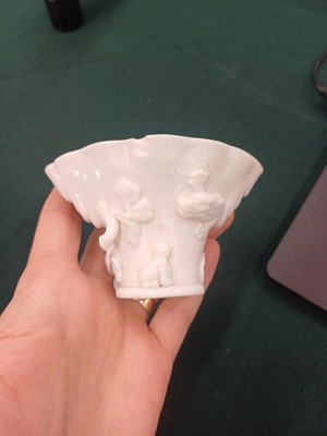 Lot 440 - A Chinese Dehua libation cup and a blanc-de-chine bowl, Kangxi period and later