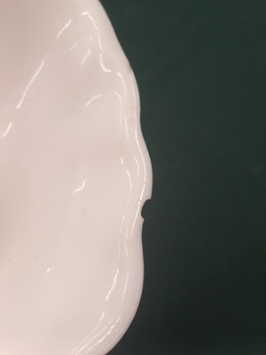 Lot 440 - A Chinese Dehua libation cup and a blanc-de-chine bowl, Kangxi period and later