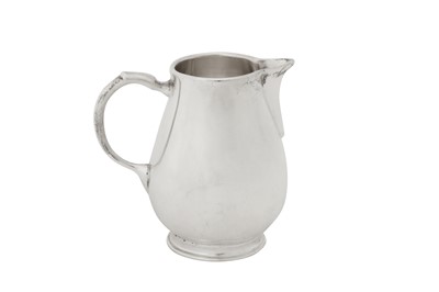 Lot 477 - A George I Britannia standard silver 'sparrow beak' cream jug, London 1723 by William Fleming (reg. April 1697)