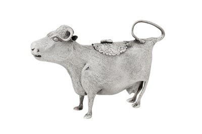 Lot 437 - A George III sterling silver cow creamer, London 1762 by John Schuppe (reg. 28th June 1753)