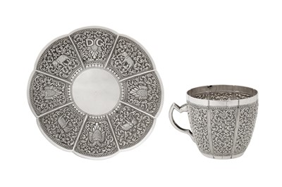 Lot 156 - An early 20th century Ceylonese (Sri Lankan) unmarked silver cup and saucer, Kandy circa 1920