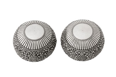 Lot 196 - A pair of late 19th / 20th century Ceylonese (Sri Lankan) unmarked silver small bowls, Kandy or Colombo circa 1900