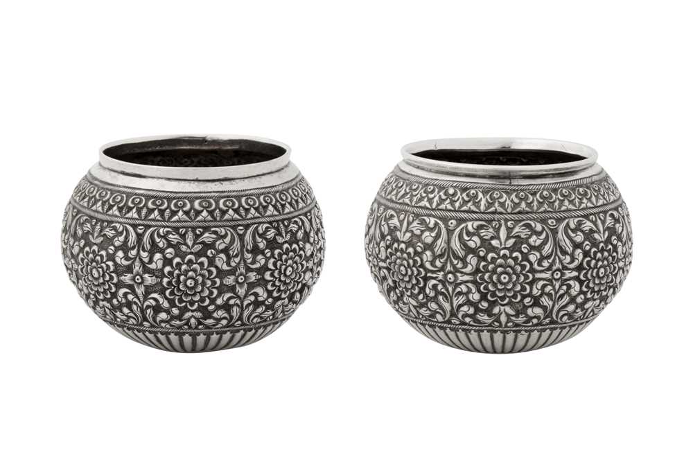 Lot 196 - A pair of late 19th / 20th century Ceylonese (Sri Lankan) unmarked silver small bowls, Kandy or Colombo circa 1900