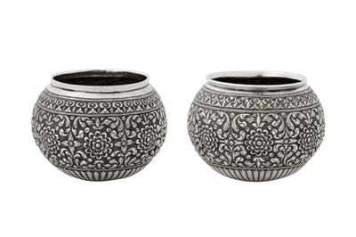 Lot 148 - A pair of late 19th / 20th century Ceylonese (Sri Lankan) unmarked silver small bowls, Kandy or Colombo circa 1900