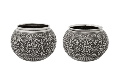 Lot 196 - A pair of late 19th / 20th century Ceylonese (Sri Lankan) unmarked silver small bowls, Kandy or Colombo circa 1900