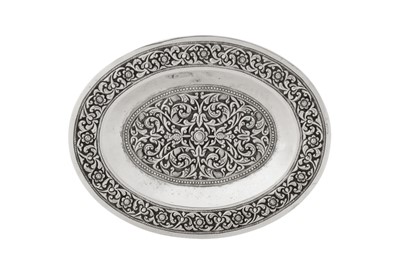 Lot 140 - An early to mid - 20th century Ceylonese (Sri Lankan) unmarked silver dish, Kandy circa 1920 – 40