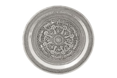 Lot 154 - An interesting early to mid - 20th century Ceylonese (Sri Lankan) unmarked silver dish, Kandy circa 1920 – 40