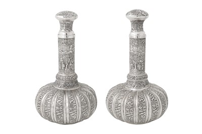 Lot 170 - A pair of early to mid-20th century Cambodian silver bottles, circa 1930-50