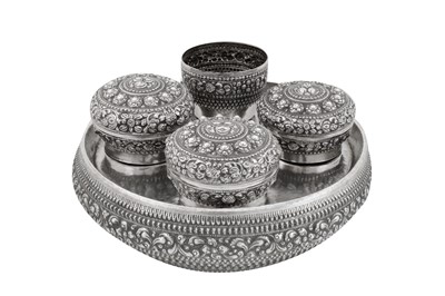 Lot 176 - A large mid - 20th century Thai silver betel nut set, dated 1953