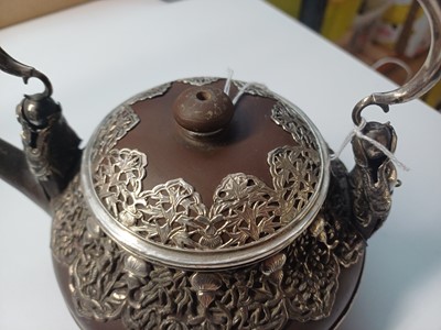 Lot 954 - A CHINESE YIXING TEAPOT WITH VIETNAMESE SILVER MOUNTS