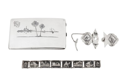 Lot 236 - A mid-20th century Iraqi silver and niello cigarette case, Omara circa 1942 signed Sa’ad