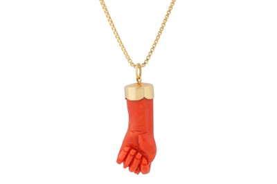 Lot 22 - λ A CORAL MANO FIGA PENDANT NECKLACE