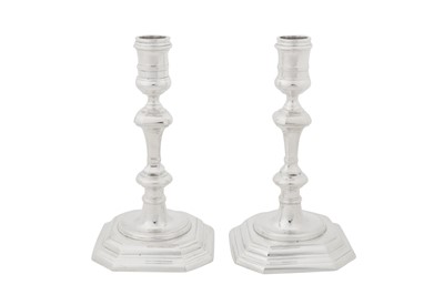 Lot 369 - A pair of Elizabeth II cast sterling silver candlesticks, London 1957 by Edward Barnard and Sons