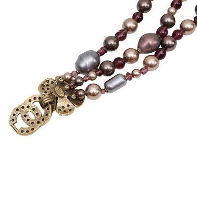 Lot 50 - Chanel Purple Pearl Camellia CC Bracelet
