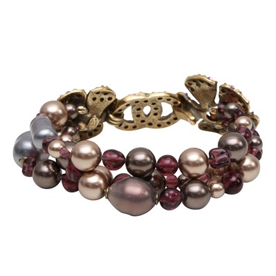 Lot 50 - Chanel Purple Pearl Camellia CC Bracelet