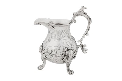 Lot 453 - A very rare George II sterling silver cast cream jug, London 1756 by William Cripps (reg. 31st Aug 1743)