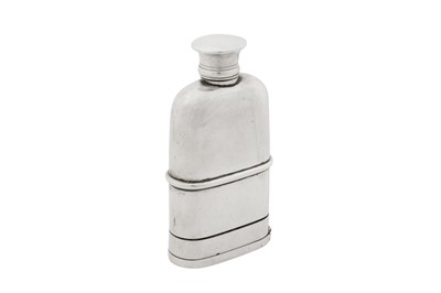 Lot 44 - A Victorian sterling silver scent bottle / vinaigrette combination, London 1871 by William Henry Dee