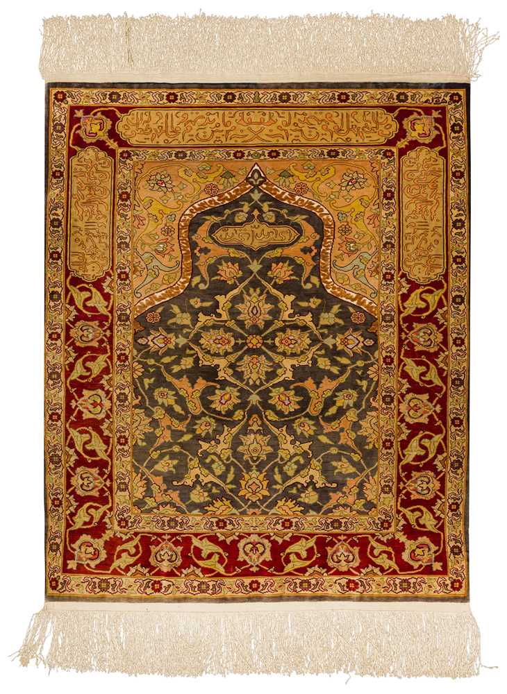 Lot 17 - AN EXTREMELY FINE SILK AND METAL THREAD SIGNED HEREKE PRAYER RUG, TURKEY