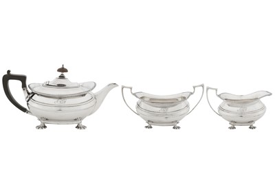 Lot 378 - A George V sterling silver three – piece tea service, London 1920 by George Howson