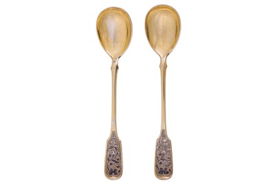 Lot 250 - A pair of Alexander II mid-19th century Russian 84 zolotnik silver gilt and niello spoons, Moscow 1859 by Andrey Vekman (active 1860-1884)