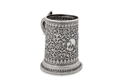 Lot 121 - A late 19th century Anglo – Indian silver mug, Cutch, Bhuj circa 1890 by Oomersi Mawji (active circa 1860-90)